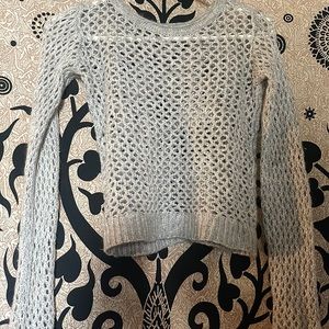 Very cute knitted sweater can wear it over a cute tank top!